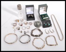 A group of vintage silver jewellery to include cas