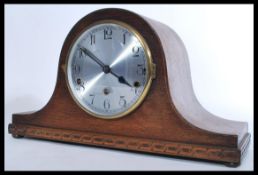 A vintage 20th Century Edwardian oak cased eight d