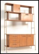 A vintage 1960's room divider buffet on tubular me