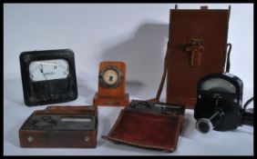 A group of vintage scientific electrical meters to include Ampmeters , Phillips Harris , two cased