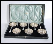 A fantastic cased set of six Walker and Hall A1 silver plates chocolate miniature saucepans 51875