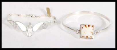 A 925 silver bracelet with unusual foliate style l