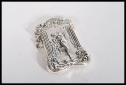 A sterling silver vesta case having embossed decor