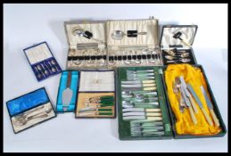 A group of cased silver plated flatware to include