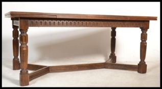 A large Jaycee Jacobean revival extending oak refe