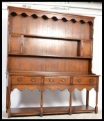 A Brights of Nettlebed 17th Century style oak dres