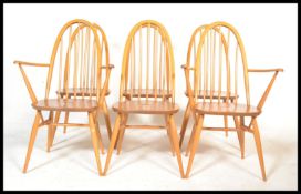 A set of six Ercol Windsor Quaker hoop-back dining chairs in light elm consisting of four dining