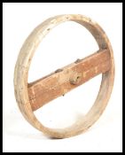 A believed early 18th century wooden pulley / cart