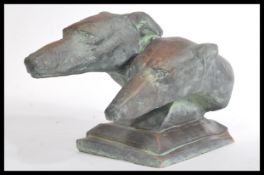 A 20th century large bronzed terracotta studio pottery diorama bust study of a pair of greyhounds