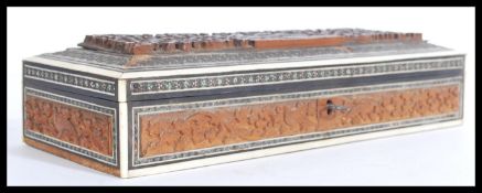 A 19th century Vizagatapan box with carvings depic