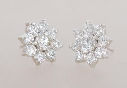 A pair of 18ct white gold diamond cluster earrings