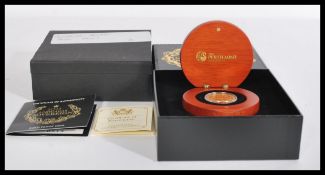 Australia Sovereign - A 2014 Australian Gold Proof Sovereign 22ct coin in capsule case within wooden
