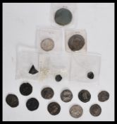 A group of various Roman coins to include a BRONZE