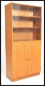 A vintage retro 20th century teak wood upright boo