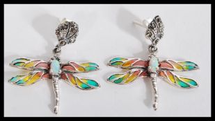 A pair of silver and plique a jour earrings in teh
