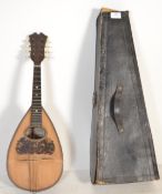 Musical Instruments. A vintage cased Italian mandolin bearing label for Domenico Banoni,