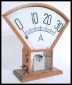 A vintage 20th century Scientific electrical meter measure by Griffin and George having a triangular
