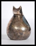 A vintage 20th century Dansk silver plated paperwe