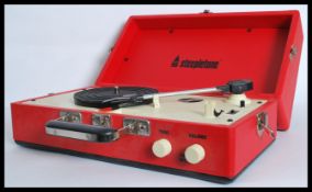 A Steepletone SRP025 retro vintage style portable vinyl record player with detachable speaker and
