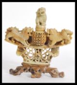 An early 20th century carved soapstone Chinese cen