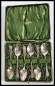 A cased set of six Georgian silver hallmarked tea spoons in the Old Englsih pattern having reverse