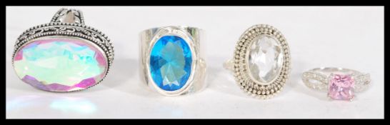 A collection of 4 925 silver rings set with various stones. Marked 925. Weight approx 32.5g.