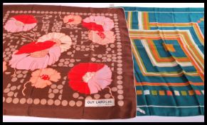 Two vintage 20th century silk scarves one buy Guy Laroche and the other having geometric designs.