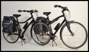 A pair of Specialized Globe Hybrid mountain bikes, His and Hers 28 speed, Shimano components,