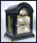 A Kieninger of Germany EBONISED mahogany cased musical bracket clock, in the 18th century style