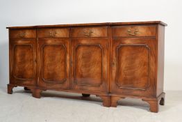 A good flame mahogany large breakfront sideboard b