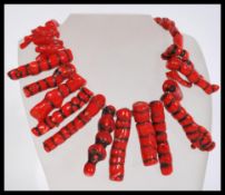 A vintage 20th century large baroque coral necklace having a white metal hook clasp. The necklace
