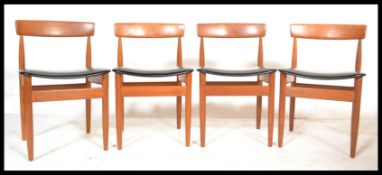Frem Rojle for Hans Olsen - A set of six elm dining chairs raised on tapering legs and supports with