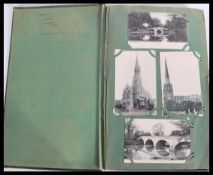 A good early 20th century vintage postcard album c