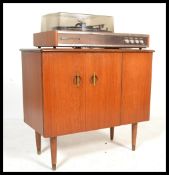 A vintage retro Prinz Sound stereo system 6 having a Garrard 2025 record deck above a teak music