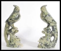 A pair of early 20th century Chinese carved figuri