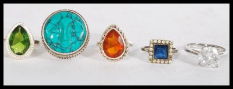 A collection of 925 silver rings set with various stones. Marked 925. Weight approx 27.5g.