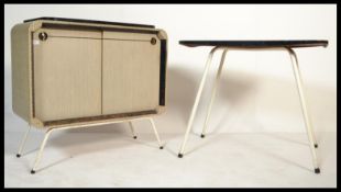 Arvin Furniture - A mid 20th century retro vintage Formica table and sideboard. The sideboard raised