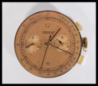A vintage early to mid 20th century Chronographe Suisse chronograph wristwatch movement with twin