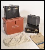 A stack of vintage trunks to include a Mothers Pri