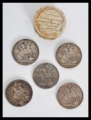 A group of 19th century silver crowns coins dating from the earliest 19th century to include