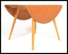 A vintage retro 20th century Ercol beech and elm d