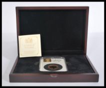 Gold Sovereign - A 2014 Tower Hill gold sovereign coin within capsule case complete with