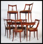 A retro 1970's dark teak wood dining room suite co