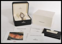 An Omega Speedmaster Racing Michael Schumacher signature edition automatic wrist watch complete in