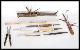 An early 20th century large Swiss army knife / tan