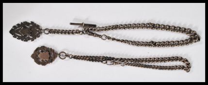 Two early 20th century silver hallmarked pocket watch fob chains having hallmarked armorial shield