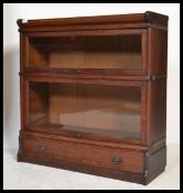 An Edwardian / early 20th century oak Lebus stacki