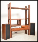 A retro 1970s teak wood Ferguson hi-fi and speakers with inset Garrard Deck SP25 MkII set within and