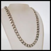 A hallmarked 925 silver heavy curb chain necklace having a lobster claw clasp. Measures 22 inches.