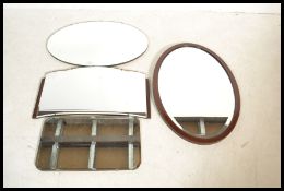 A collection of four vintage and antique mirrors t